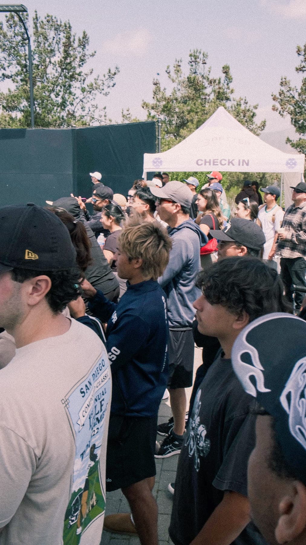 Players at a 002 tournament check-in area